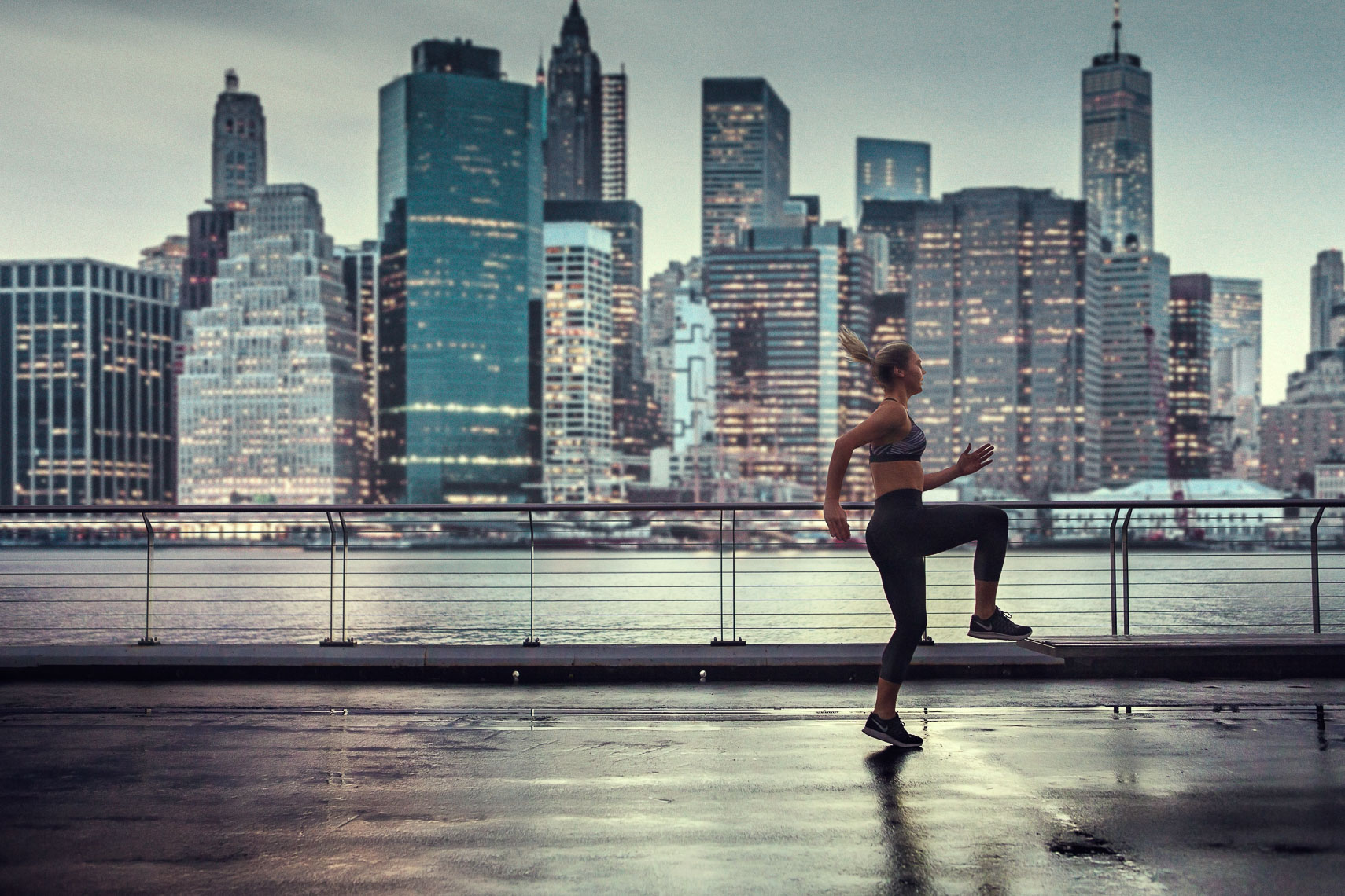 A girl exercising in New York City on a photoshoot for an advertising agency 