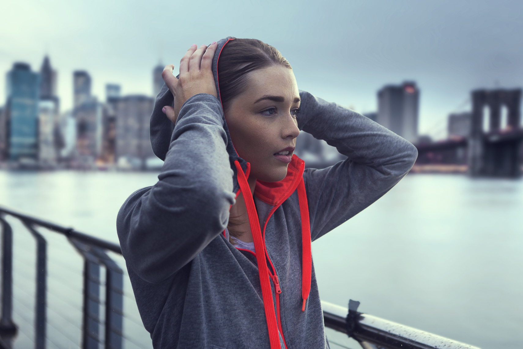A girl exercising in New York City on a lifestyle photoshoot for an advertising agency 